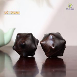 Bi lăn tay gỗ tử đàn hình lăng trụ 12 điểm lồi massage